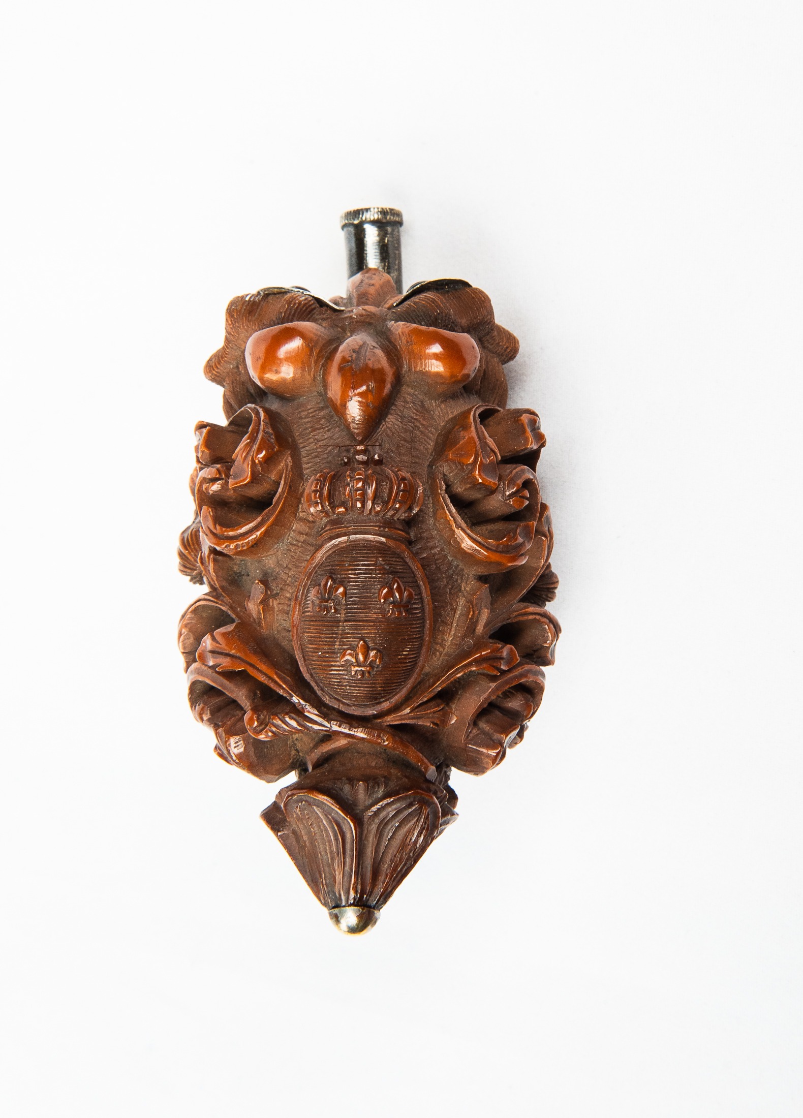 Opposite side of the coquilla nut snuff bottle carved with French royal symbols